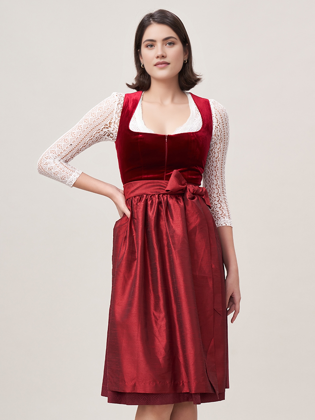 Schwarzes Dirndl mit roter Schürze
